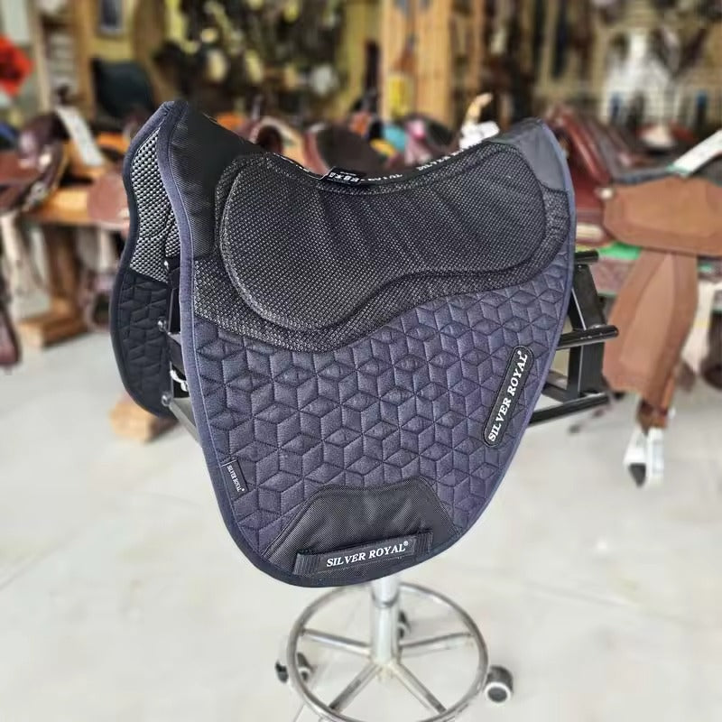 Gray saddle pad with 'Silver Royal' branding on a stool in a store setting.